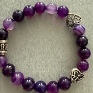 Beautiful agate purple swirl gemstone bracelet with silvery hearts.
